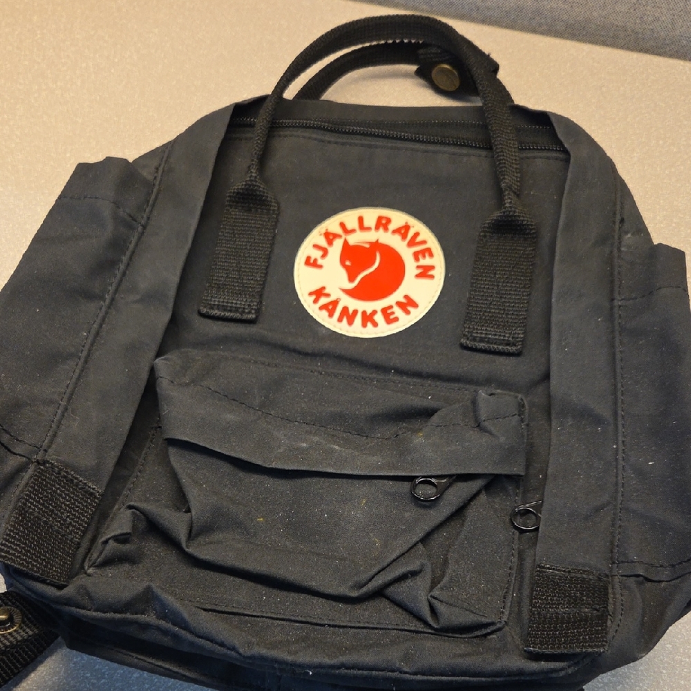 Fjallraven Kanken Backpack in Black with Red Logo